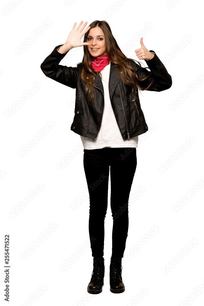 Full-length shot of Young woman with leather jacket counting six with fingers on isolated white background Full-length shot of Young woman with leather jacket counting six with fingers on isolated white background