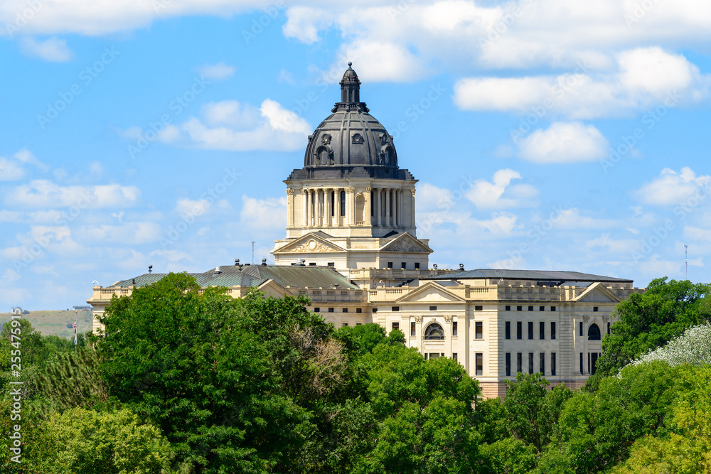 South Dakota Capitol Building under blue sky with clouds