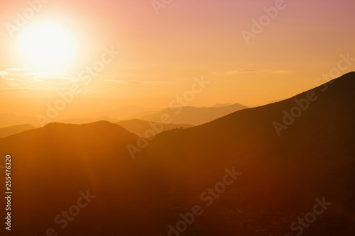 Beautiful sunset colors over the mountains of Peloponnese, Greece. © MNStudio