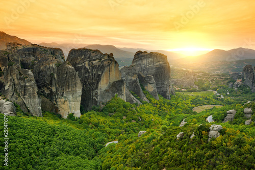 Panoramic view of Meteora valley, a rock formation in central Greece hosting one of the largest complexes of Eastern Orthodox monasteries, built on immense natural pillars.