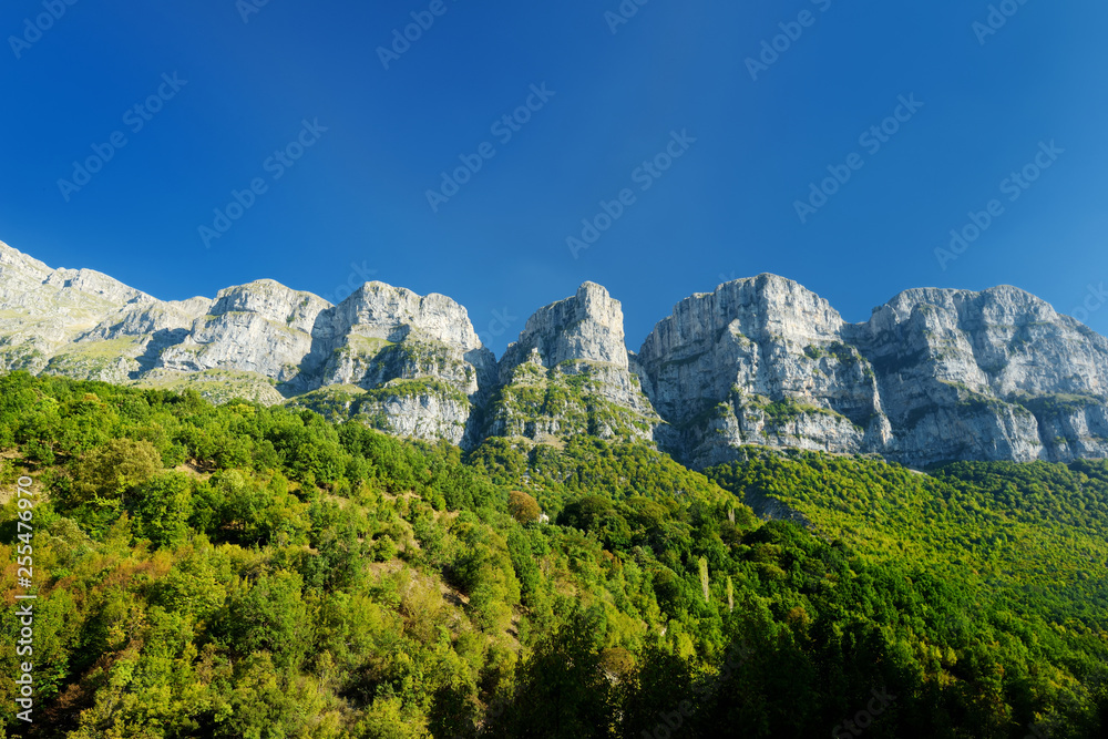 Scenic view of magnificent mountains on sunny autumn day in Zagori region, Northern Greece.