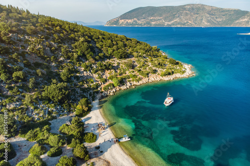 Destination wedding on a beach. Scenic aerial view of picturesque jagged coastline of Kefalonia with clear turquoise waters. Cephalonia, Greece.