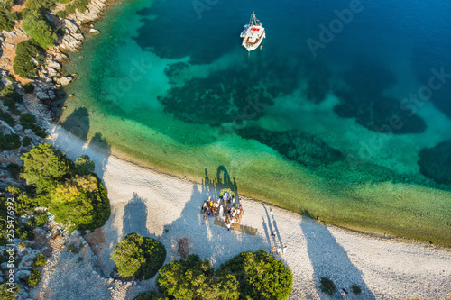 Destination wedding on a beach. Scenic aerial view of picturesque jagged coastline of Kefalonia with clear turquoise waters. Cephalonia, Greece.