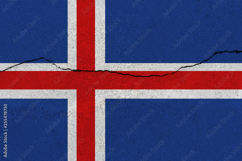 Fototapeta premium Iceland flag on concrete wall with crack
