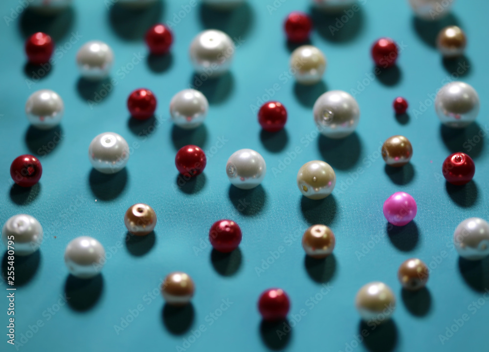 beads on colored background beads on colored background
