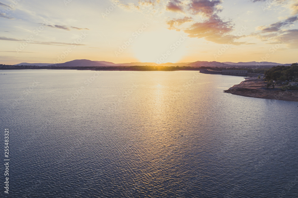 Sunset over Hume Dam and Lake Hume with copy space - aerial landscape
