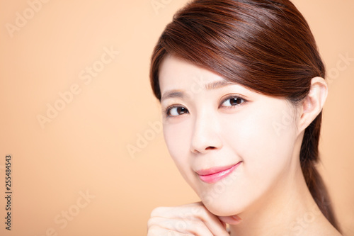 young woman with natural makeup and clean skin