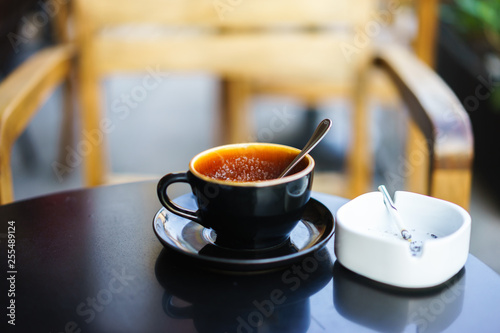 Coffee mug ion black table