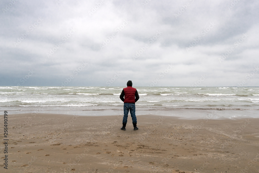 Lone traveler by the sea Lone traveler by the sea
