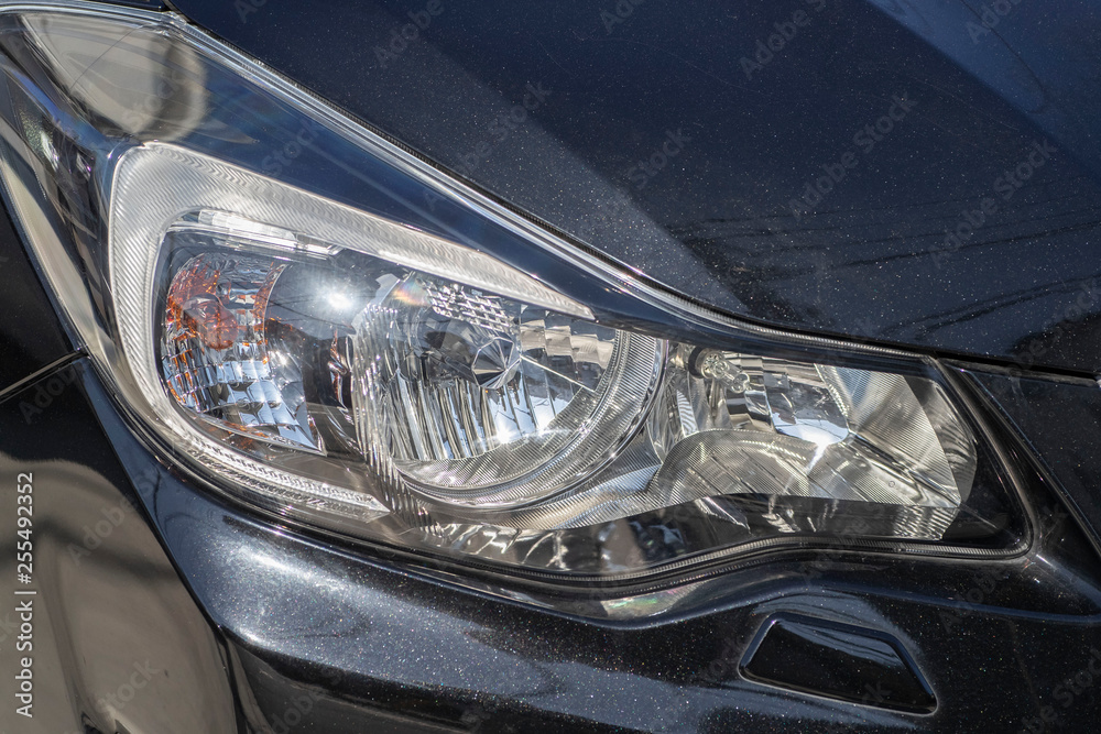Close-up Black car headlight