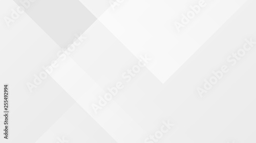 White gradient abstract polygon pattern on gray background.