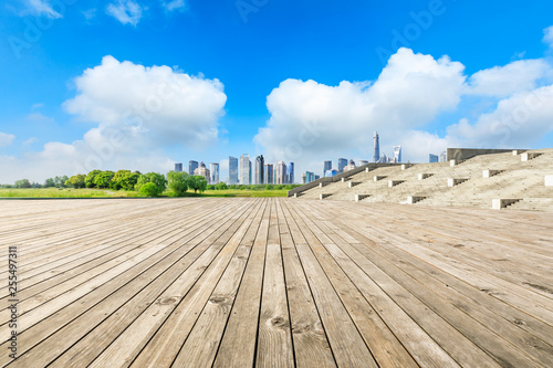Shanghai city skyline panorama and empty wooden platform floor