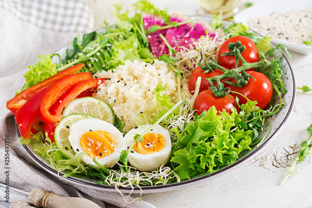 Couscous, egg and vegetables bowl. Healthy, diet, vegetarian food concept. Vegetarian buddha bowl. Couscous, egg and vegetables bowl. Healthy, diet, vegetarian food concept. Vegetarian buddha bowl.