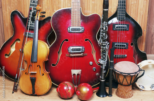 Three electric guitars  violin  maracas  djembe