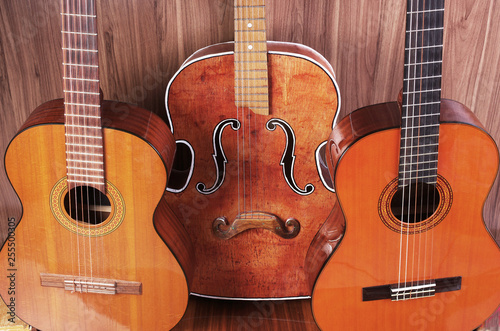 Three vintage acoustic guitars.