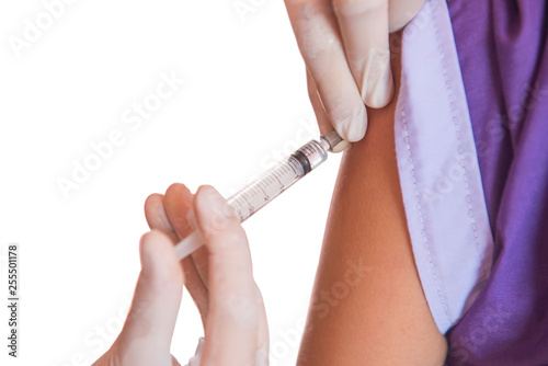 closeup of doctor injecting patient with syringe in the hospital . health care. isolated on white background of file with Clipping Path .