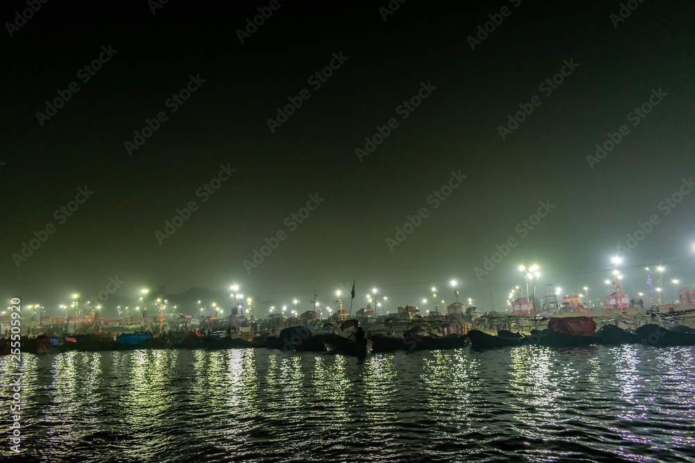Kumbha Mela, Allahabad, Uttar Pradesh, India; 17-Feb-2019; night lights over the river bank, Sangam at night, river Ganges