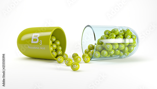 3d rendering of a vitamin capsule with vitamin B3 - nicotinic acid photo