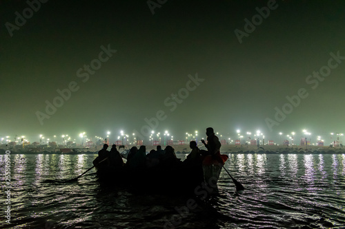 Kumbha Mela, Allahabad, Uttar Pradesh, India; 17-Feb-2019; boat ride on Triveni Sangam at night, river Ganges photo