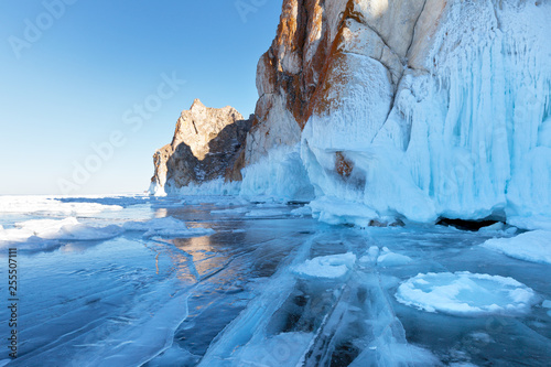 Baikal Lake in March. The beautiful ice cliffs of the island of Olkhon and the textured blue ice with cracks leave a strong impression from the winter travels on the frozen lake