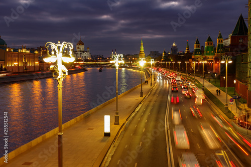Car traffic on Kremlevskaya embankment at night. Urban landscape