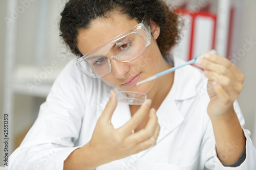 young scientist pipetting