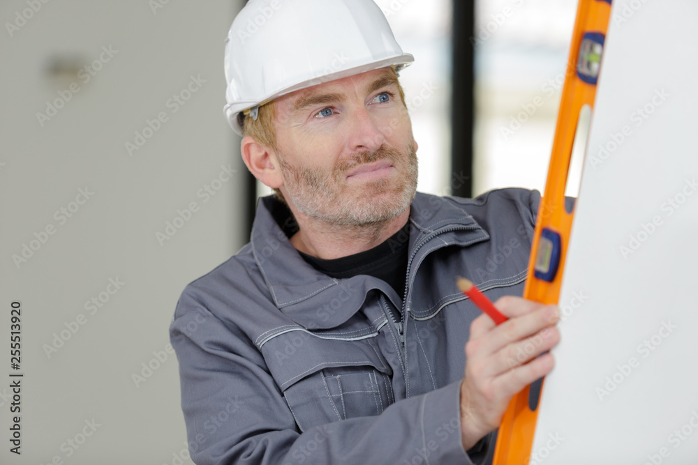 builder man working leveling wall builder man working leveling wall