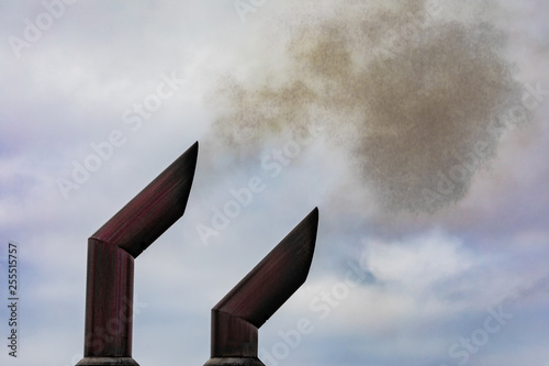 Fossil fuel black exhaust smoke pollution concept photo