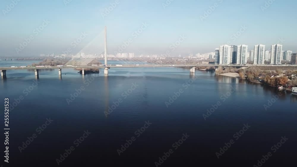 Aerial of the south bridge, city Kyiv Ukraine. South Bridge city of Kiev. The river of the Dnieper, the bridge crosses the river. City landscape from a bird's eye view bridge on river Aerial of the south bridge, city Kyiv Ukraine. South Bridge city of Kiev. The river of the Dnieper, the bridge crosses the river. City landscape from a bird's eye view bridge on river