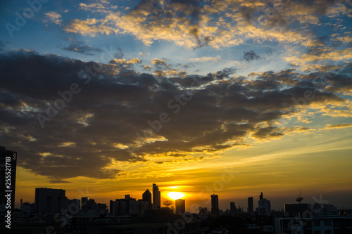 Sunrise sky silhouette city building