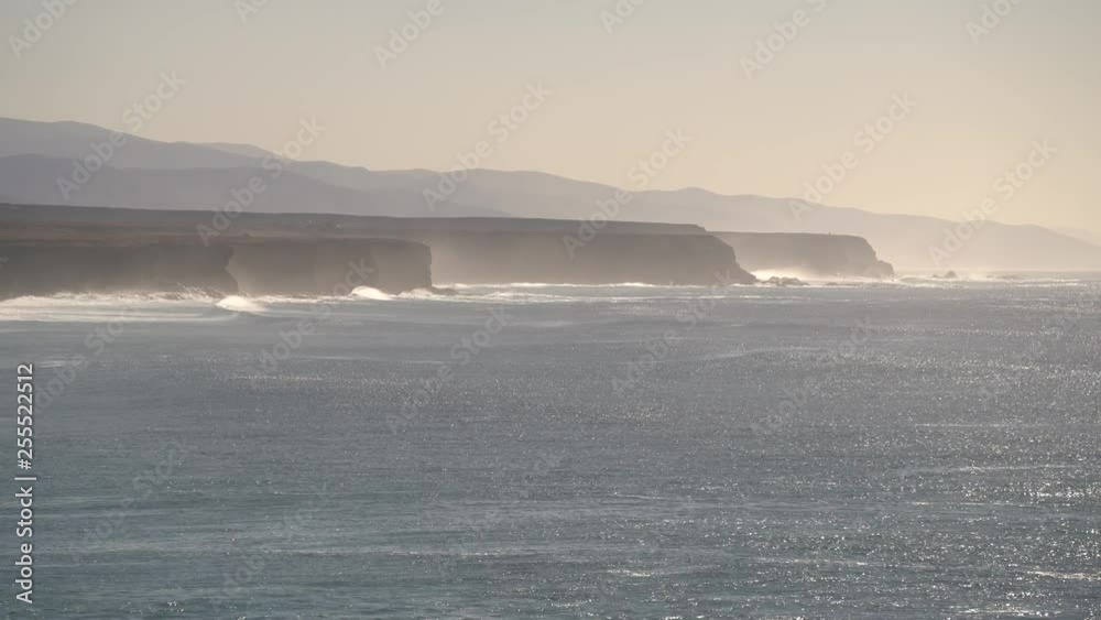 Coastline with a steep coast and the Atlantic Ocean, El Cotillo, Fuerteventura, Spain Coastline with a steep coast and the Atlantic Ocean, El Cotillo, Fuerteventura, Spain