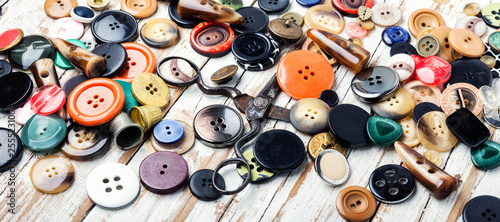 Various sewing buttons and thread