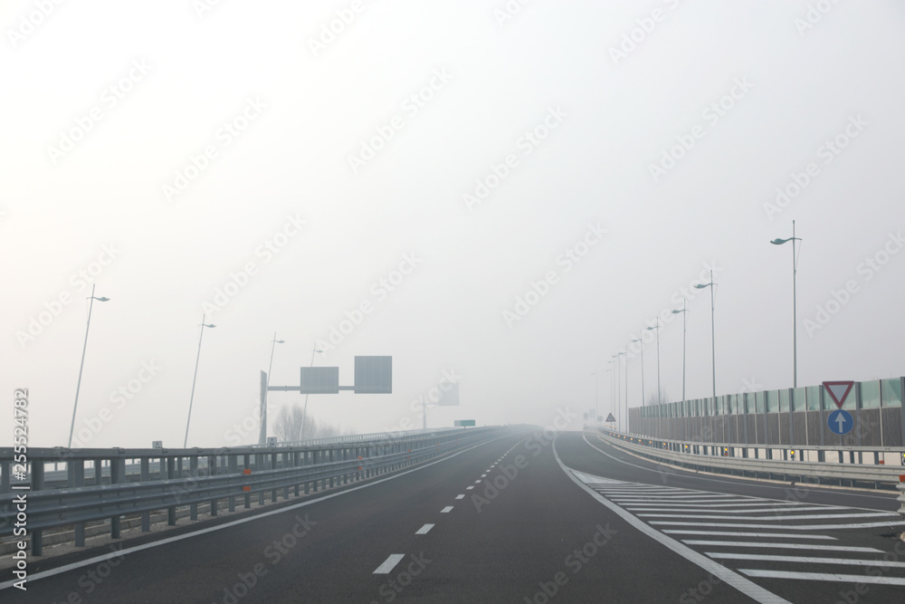 junction of the highway with very dense dangerous fog