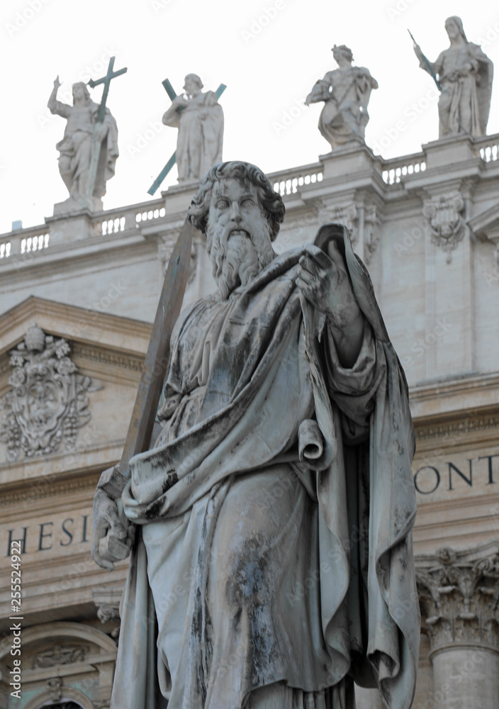 majestic statue of Saint Paul with a long beard and sword in the