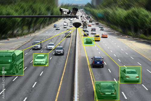 Camera that controls speeding cars and speeding on the road. photo