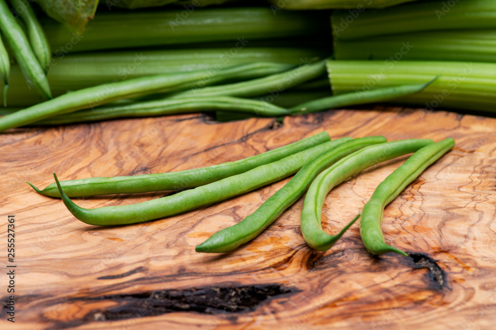 Fresh Raw Organic French Green Beans (Haricot Verts), or Filet Beans on natural olive wood. Fresh Raw Organic French Green Beans (Haricot Verts), or Filet Beans on natural olive wood.