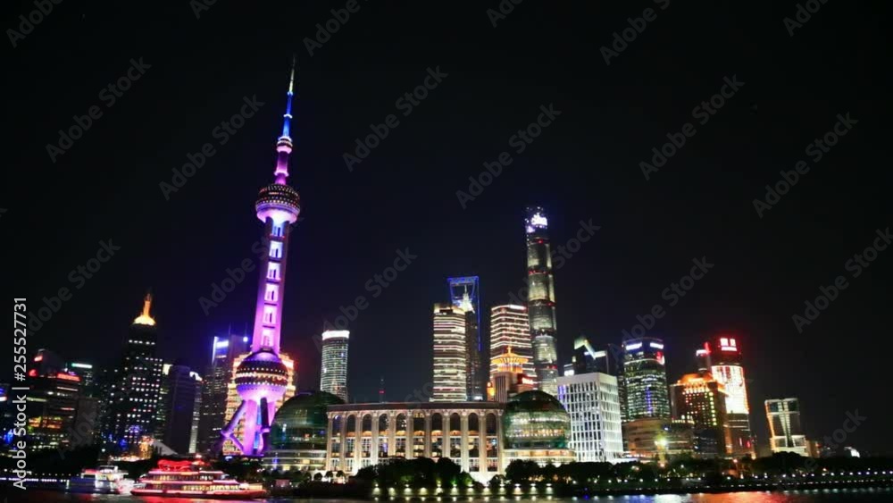 View Of Shanghai Skyline At Night. Huangpu river, Oriental Pearl Tower And City Skyline. View Of Shanghai Skyline At Night. Huangpu river, Oriental Pearl Tower And City Skyline.