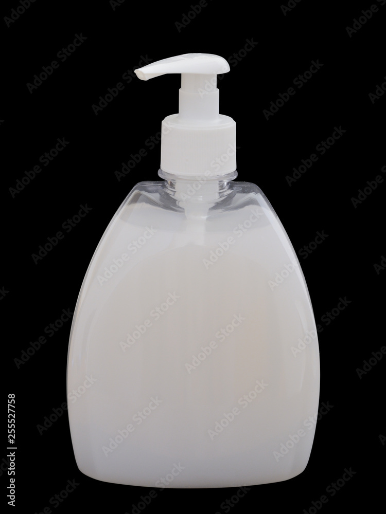 Liquid soap for hands in a plastic small bottle with the batcher. Isolated on a black background Liquid soap for hands in a plastic small bottle with the batcher. Isolated on a black background