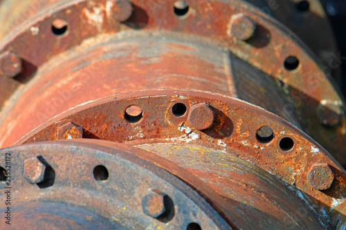 Old industrial machinery wheel detail. Rusty. Old pumping station - for water.