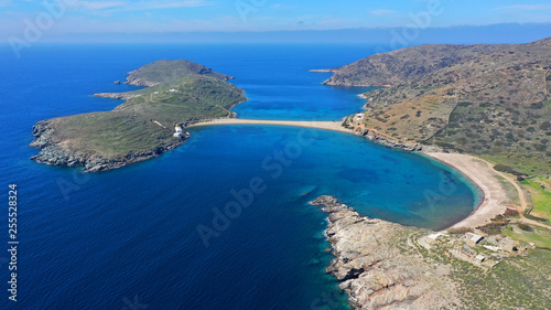 Aerial drone panoramic photo of iconic two sided sandy tropical turquoise sea paradise beach of Kolones near Fykiada in island of Kythnos at spring, Cyclades, Greece