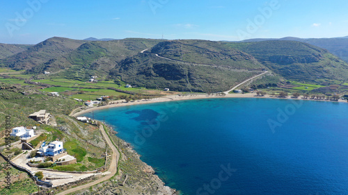 Aerial drone photo of iconic two sided sandy tropical turquoise sea paradise beach of Apokrisi near Fykiada in island of Kythnos at spring  Cyclades  Greece