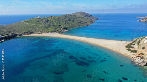 Aerial drone panoramic photo of iconic two sided sandy tropical turquoise sea paradise beach of Kolones near Fykiada in island of Kythnos at spring, Cyclades, Greece © aerial-drone