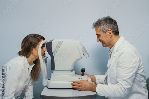 woman eyesight examination in in optic store