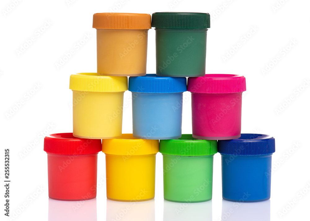 Set of Colorful Gouache jars isolated on white background with copy space. Cans of different colors gouache paints. Set of Colorful Gouache jars isolated on white background with copy space. Cans of different colors gouache paints.