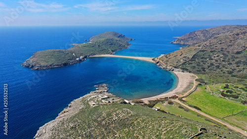 Aerial drone panoramic photo of iconic two sided sandy tropical turquoise sea paradise beach of Kolones near Fykiada in island of Kythnos at spring, Cyclades, Greece © aerial-drone