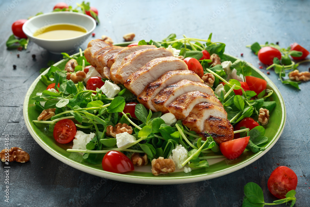 Fresh Grilled Chicken salad with tomatoes, feta cheese and vegetables
