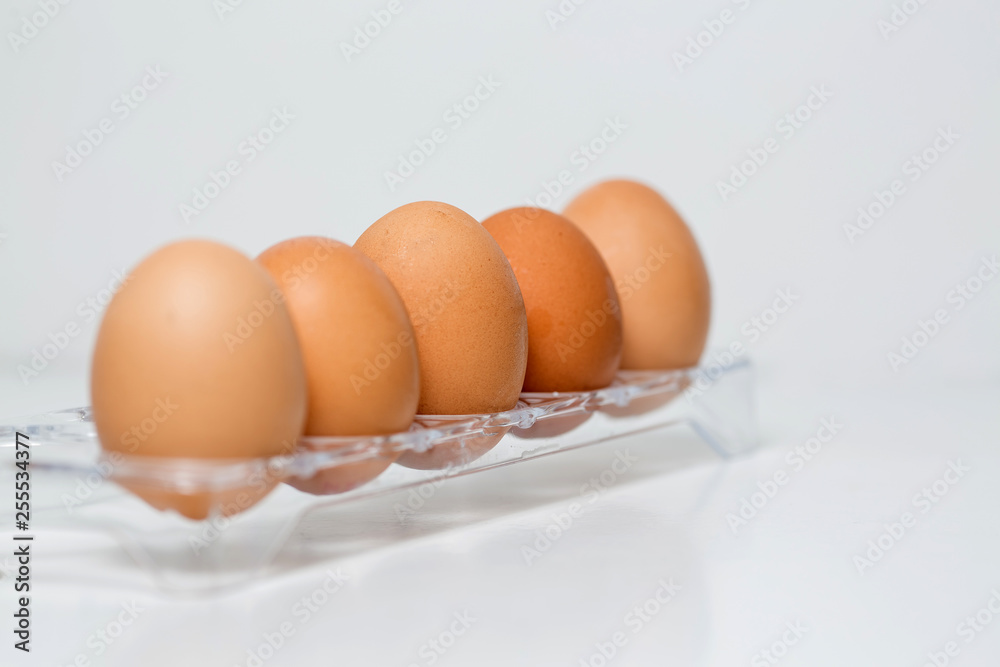 Close up of chicken eggs over white background Close up of chicken eggs over white background