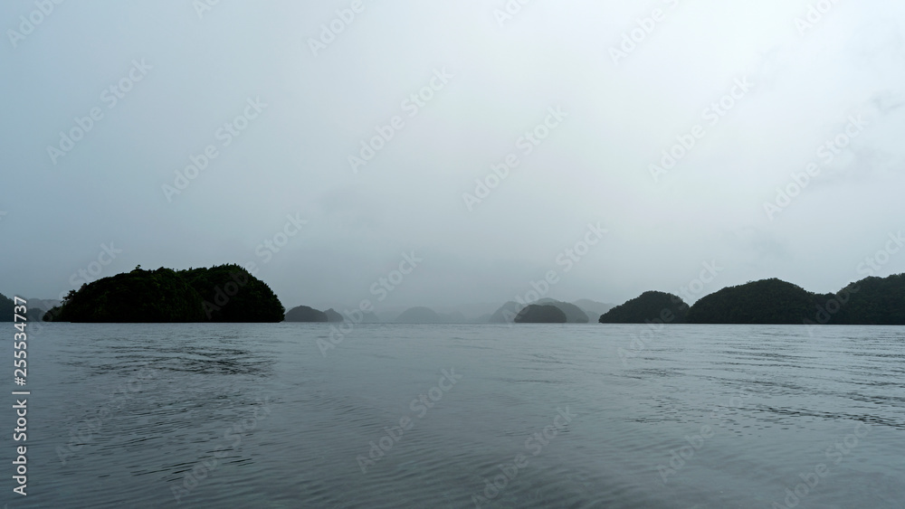 Heavy downpour can happen anytime of the year when kayaking in Palau's Rock Islands