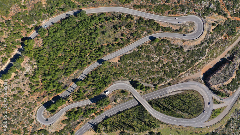 Aerial drone top view photo of snake curvy road built in steep mountain slope - obrazy, fototapety, plakaty 