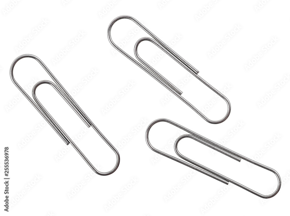 Three silver paper clips isolated on a white background. Top view.